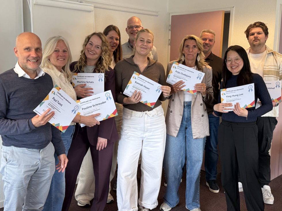 Het projectteam van Impactmakerz.nl en Mark Damman van Stichting Stadsgarage (achteraan, midden)